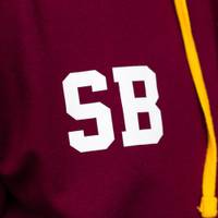 An example of student's initials printed on the front right chest of a hoodie.