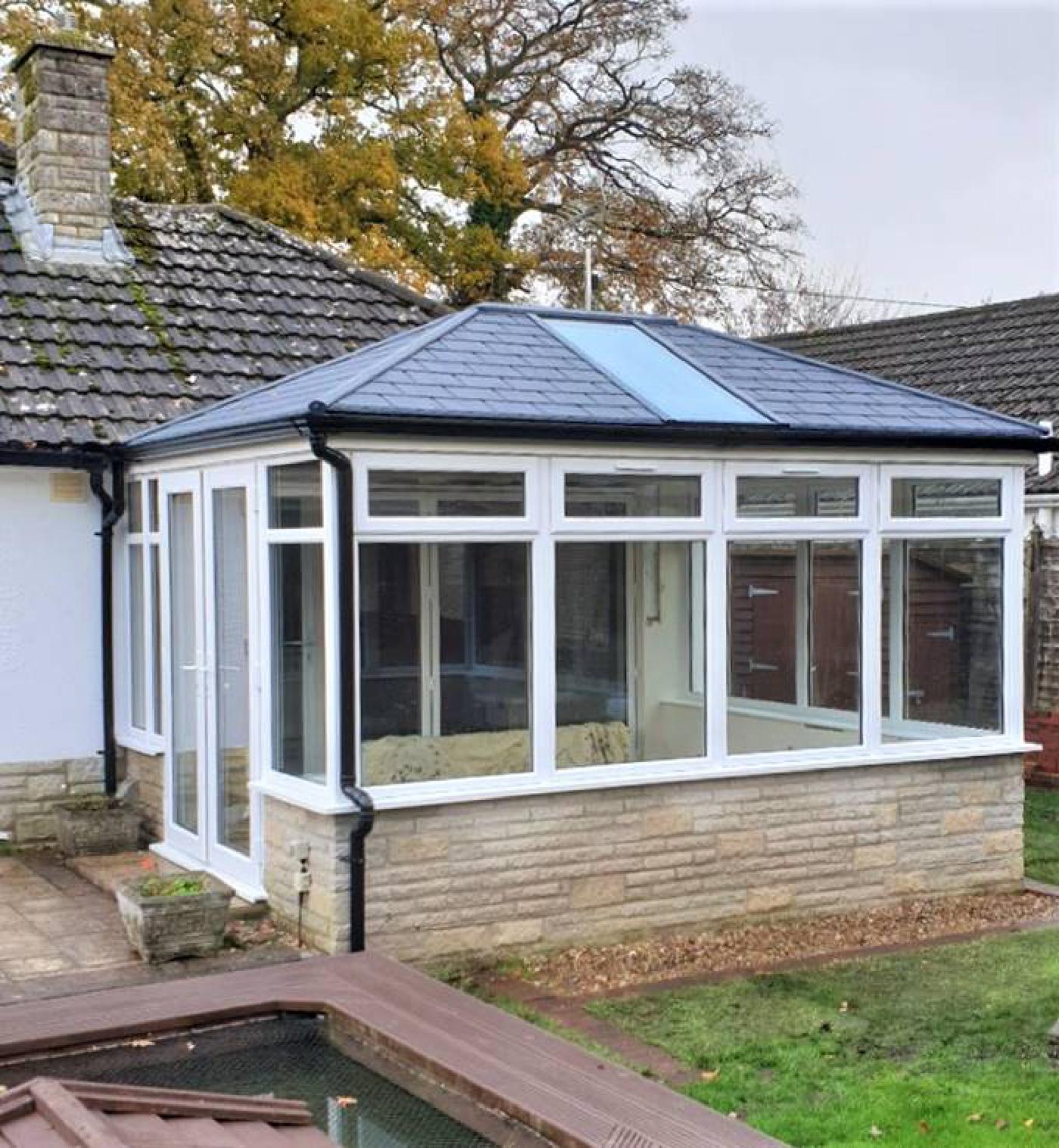 Replacement Conservatory With Solid Roof System and New Pvc Windows and