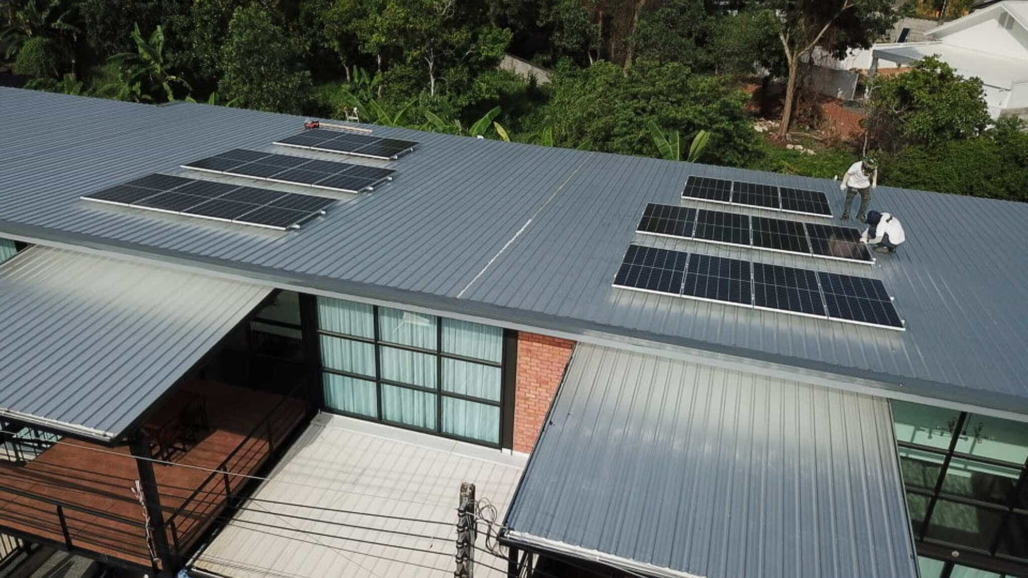 Solar power panels on a shop house roof, Phuket