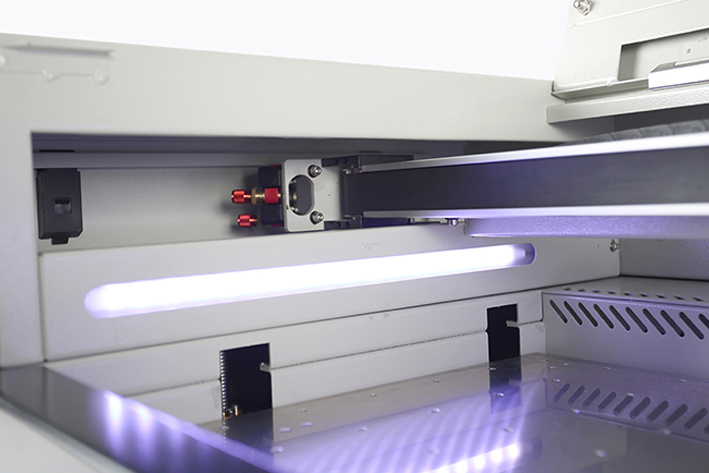 close up of laser bed on the Aeon Mira CO2 Desktop Laser Cutting Machine