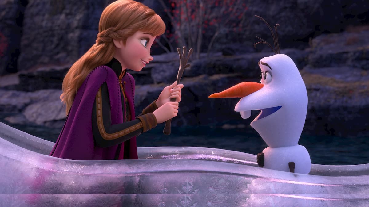 Anna and Olaf riding in a boat of ice