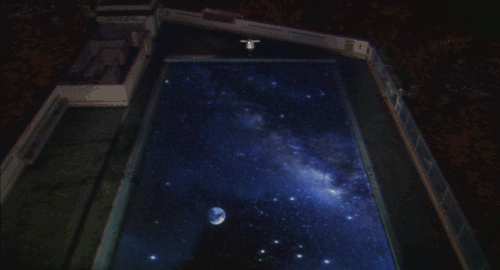 An animated gif of a scene from the film 'Kakera: A Piece of Our Life' of a swimming pool with a galaxy appearing inside the water.