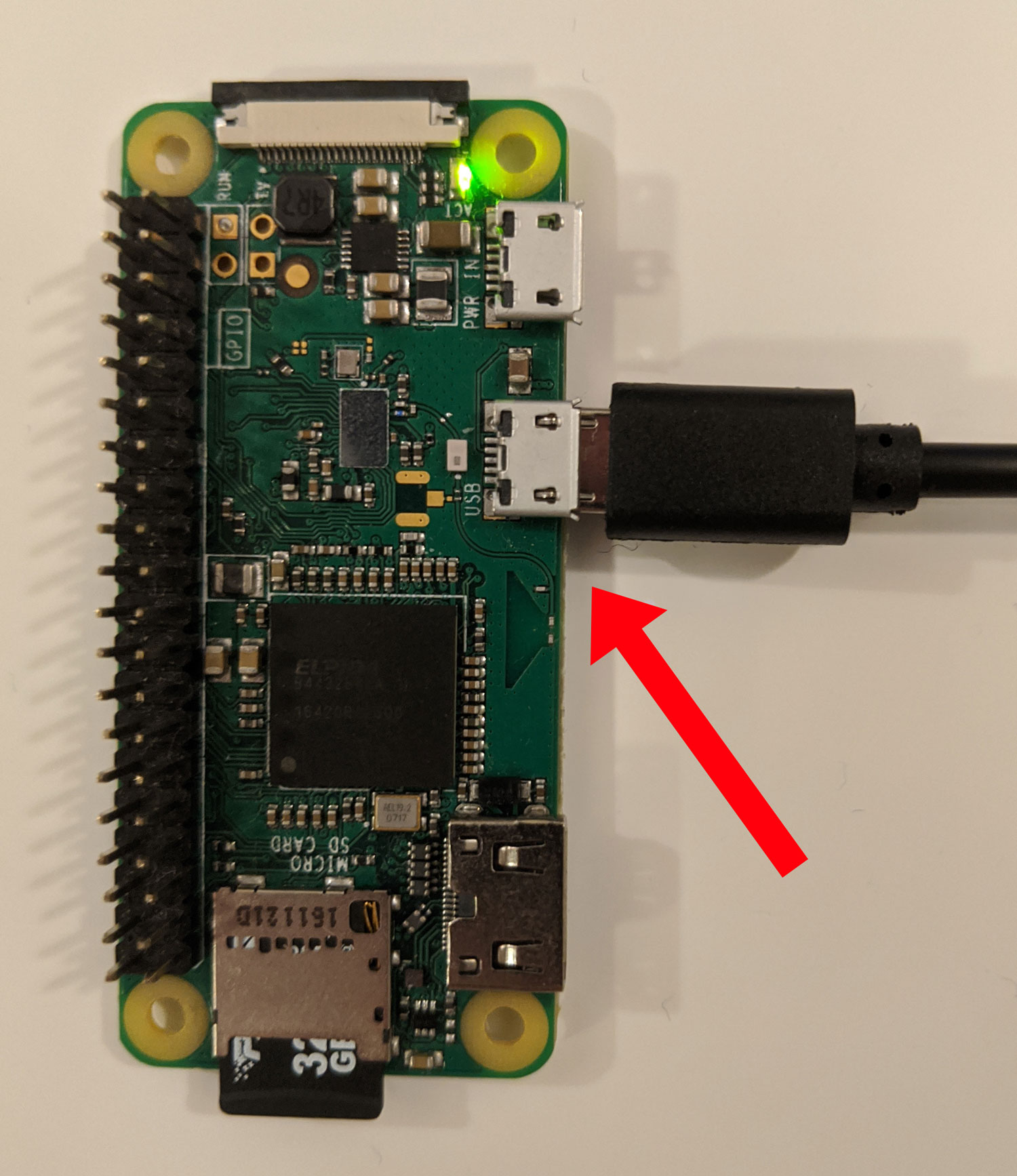 Pi Zero W with cable inserted into USB micro-USB data port
