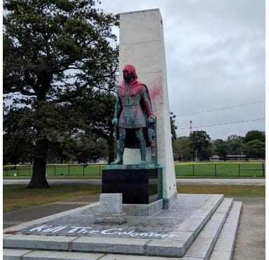 defaced Columbus statue