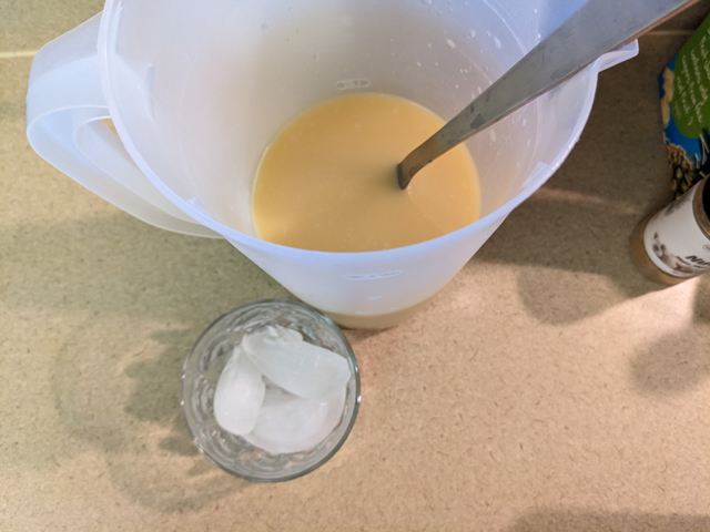 Making a Painkiller Step Five: Stirring the Ingredients