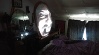 Gill witch face projection in bedroom