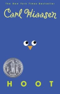 The cover of Hoot by Carl Hiaasen