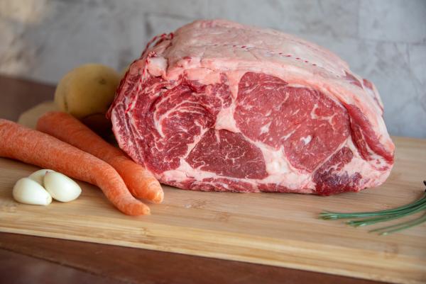 Prime rib roast on a cutting board
