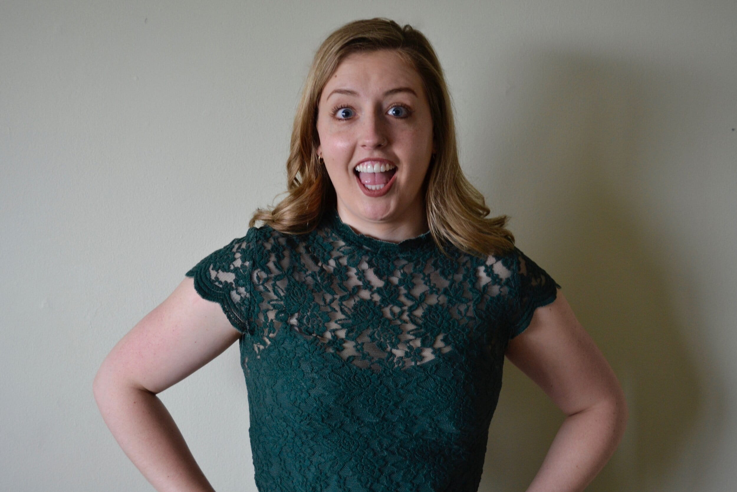 Grace Bobber smiles wearing a green top