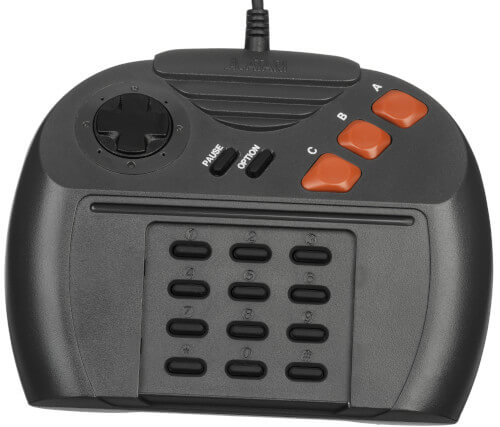 A photo of a controller the Atari Jaguar. This controller is an ergonomic nightmare, with a full 0-9 number pad underneath the main buttons