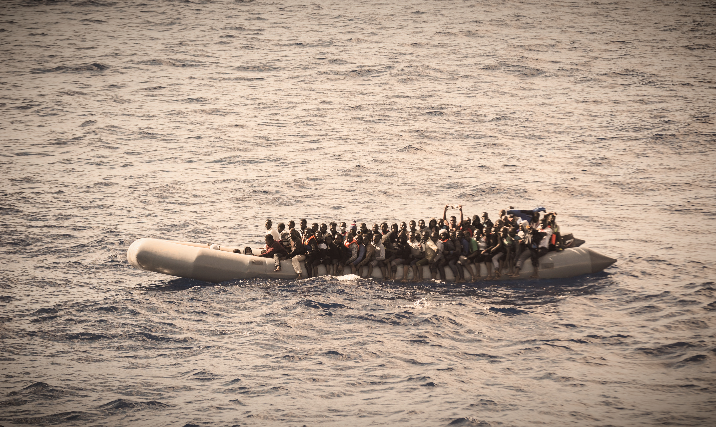 A raft filled with refugees (Shutterstock)