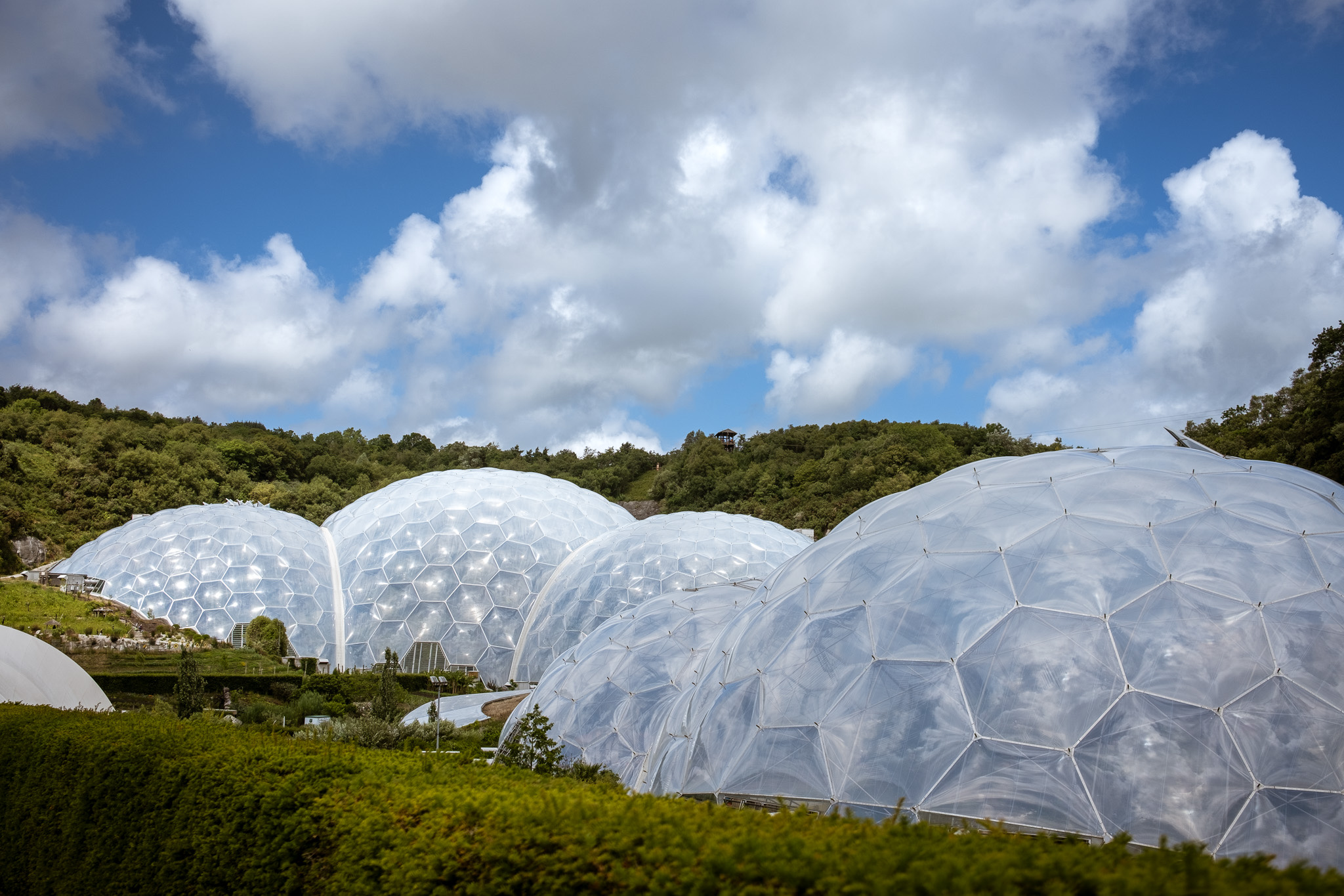 Great balloon baubles of the Eden Project stretch up into the clear blue sky