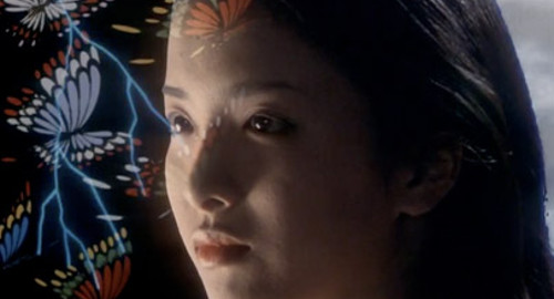 A screenshot of Gorgeous with superimposed images of butterflies. From the Japanese film 'House'.