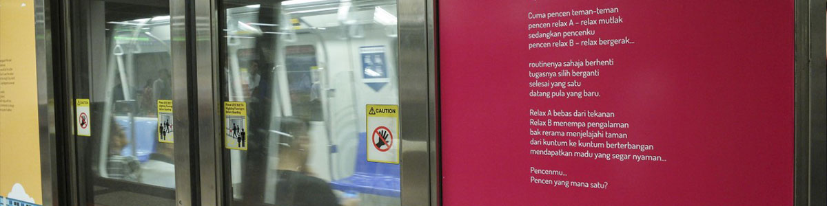 A photo of an MRT door, with a Poetry on Platforms peotry sticker on it.