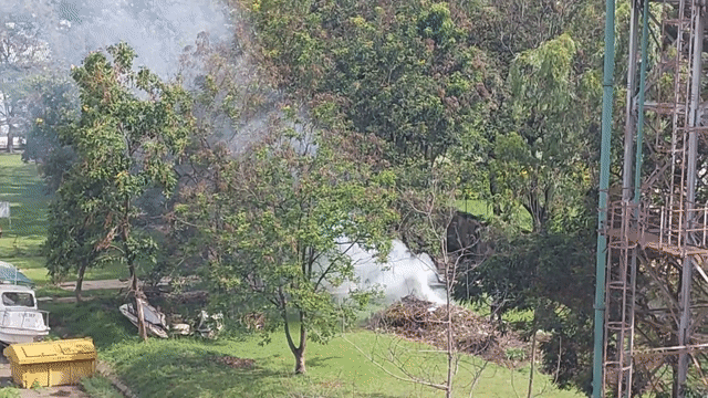 Garbage burning in a nearby compound