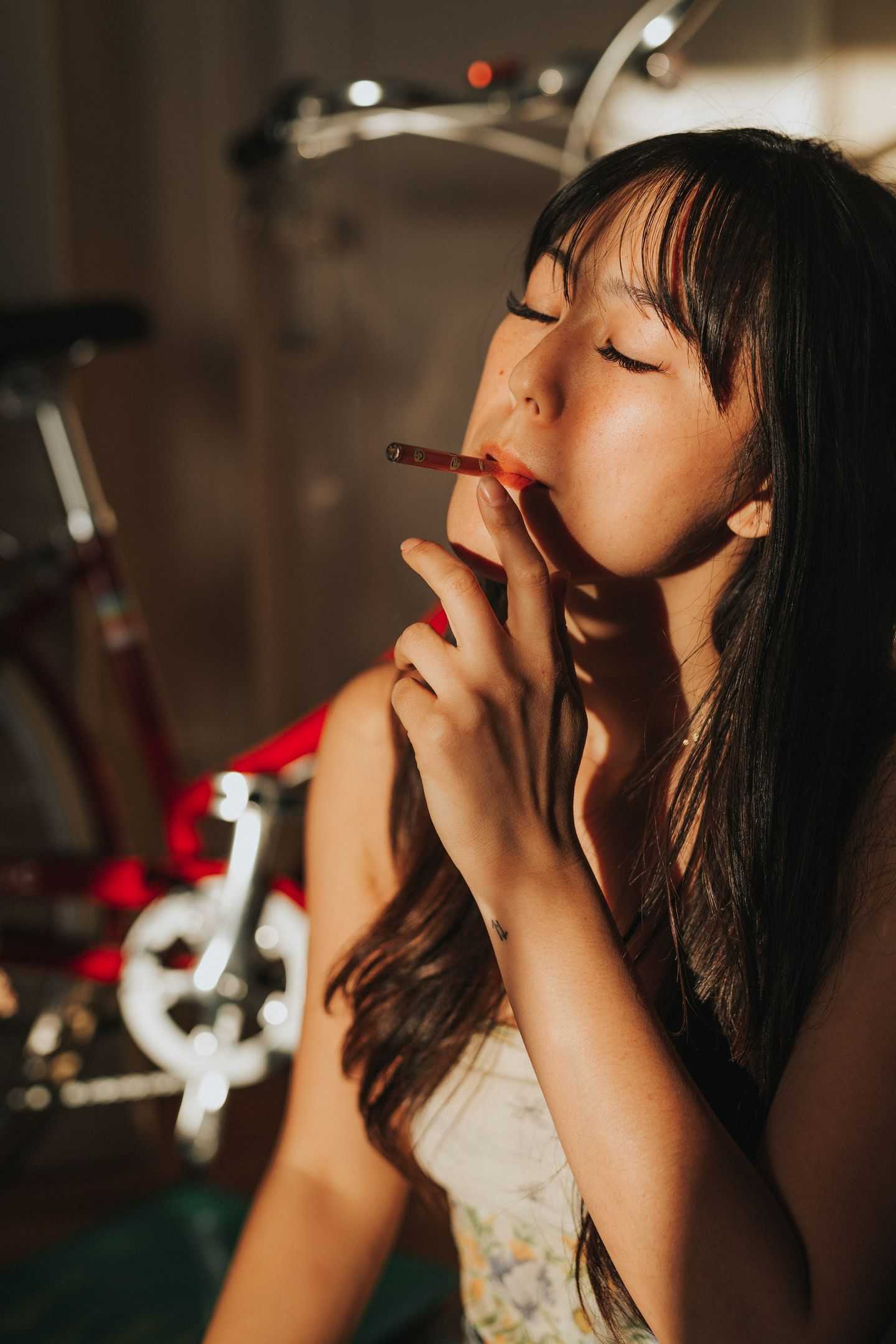 Girl smoking cannabis in the sun