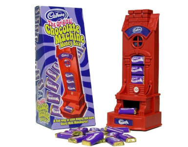 A Cadbury’s money box and chocolate dispenser..