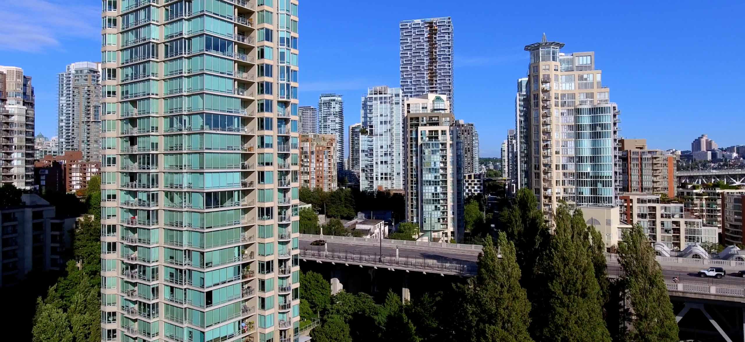 High rises in Vancouver next to a bridge
