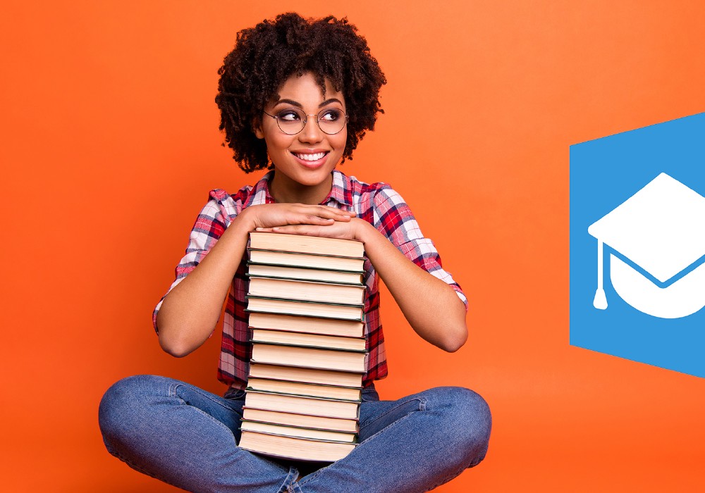 Girl sitting with books with an illustration to the right representing how education opens doors