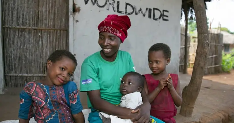 Esime Jenaia with her children at their home in Mangochi district, Malawi.