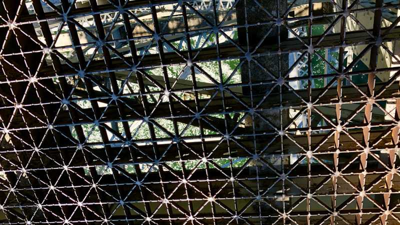 Looking through the grate in the bridge at the Columbia River