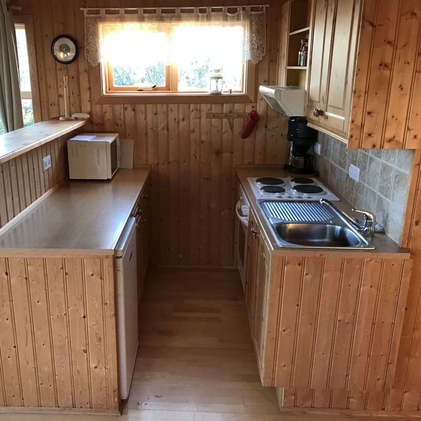 Kitchenette with stove and counter has enough space for cooking