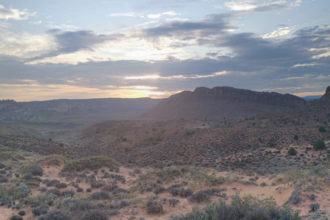 A desert sunrise over Arches National Park.
