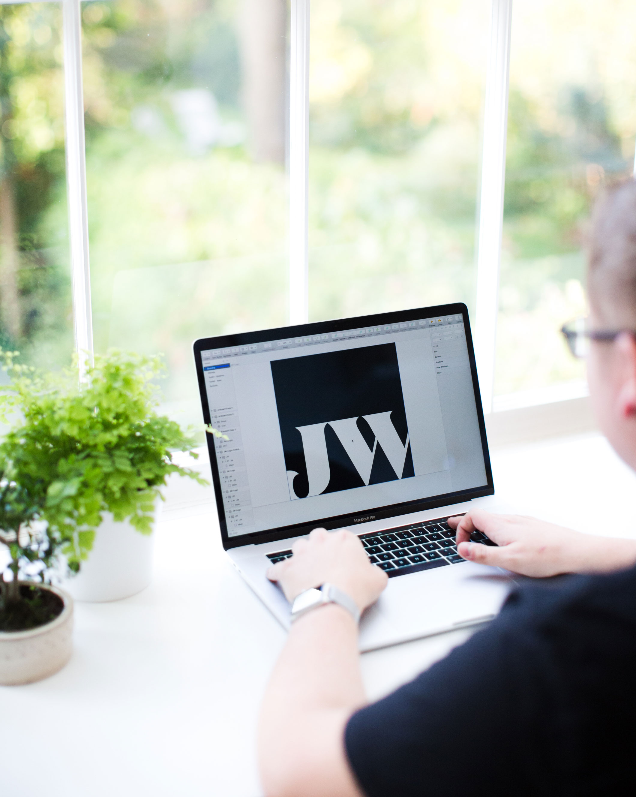Jack Watkins working at his desk