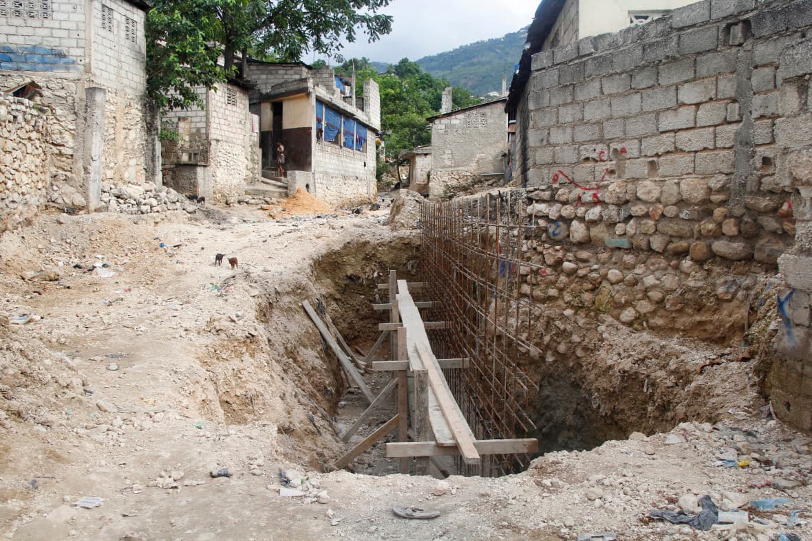 Construction of drainage canals to prevent flooding.