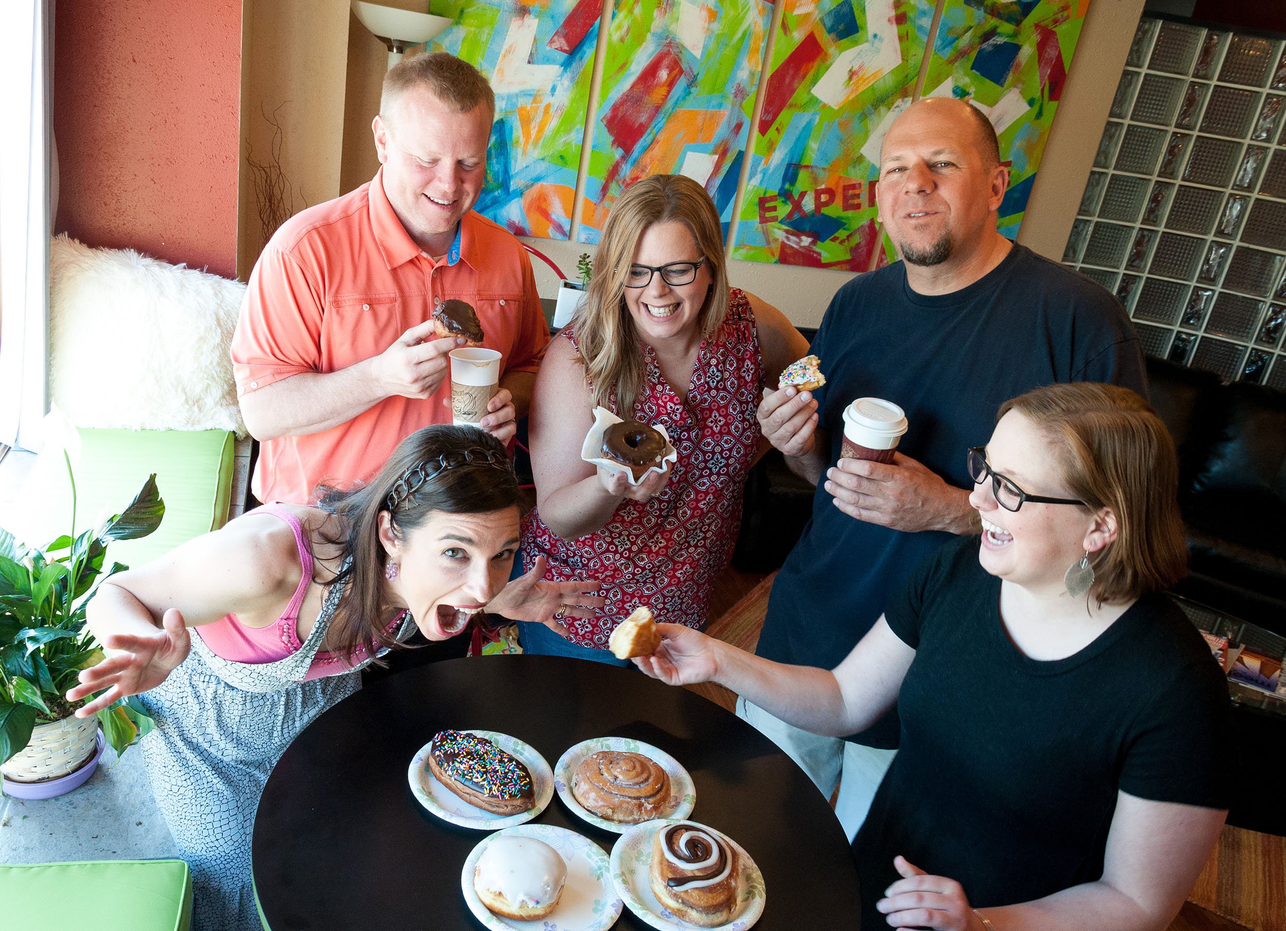 Portrait of group with donuts
