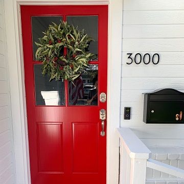 red painted door with white painted trim