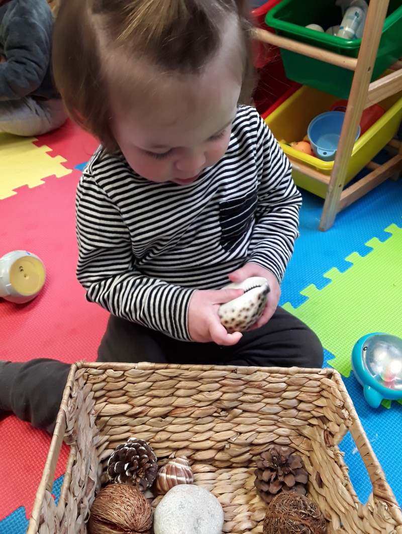 We love exploring our sensory baskets!