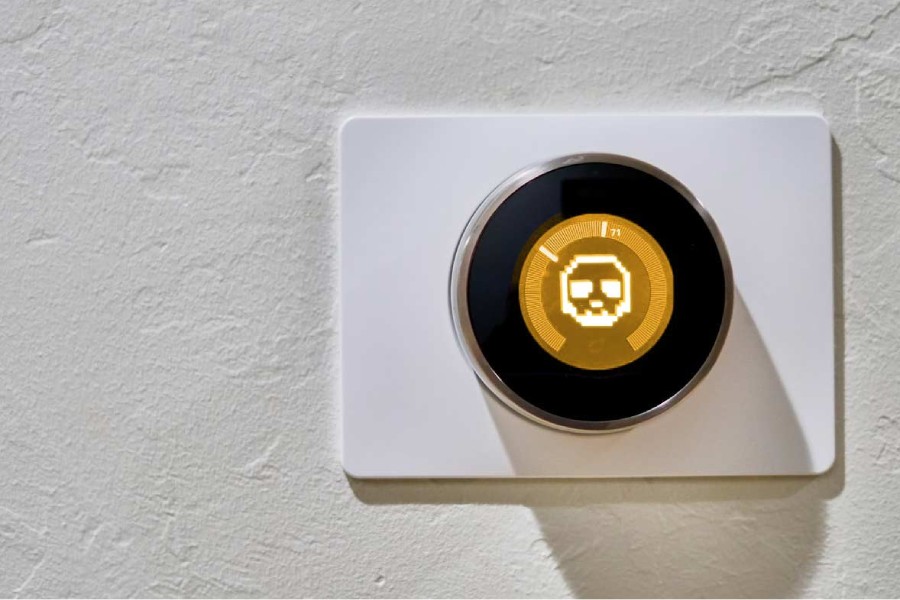 Smart thermostat displaying a skull that needs to be fixed by Managed IT Consulting and Support services in Austin, Texas, TX