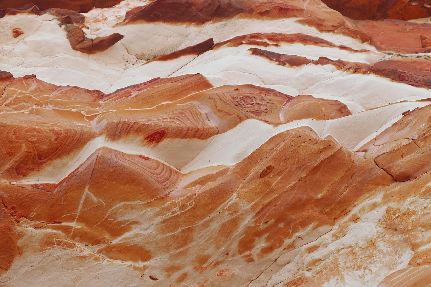 Abstract close up of a marbled brown and beige colour rock texture