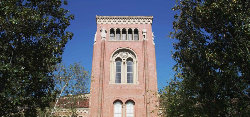 Closeup view of a historic-looking red brick academic building