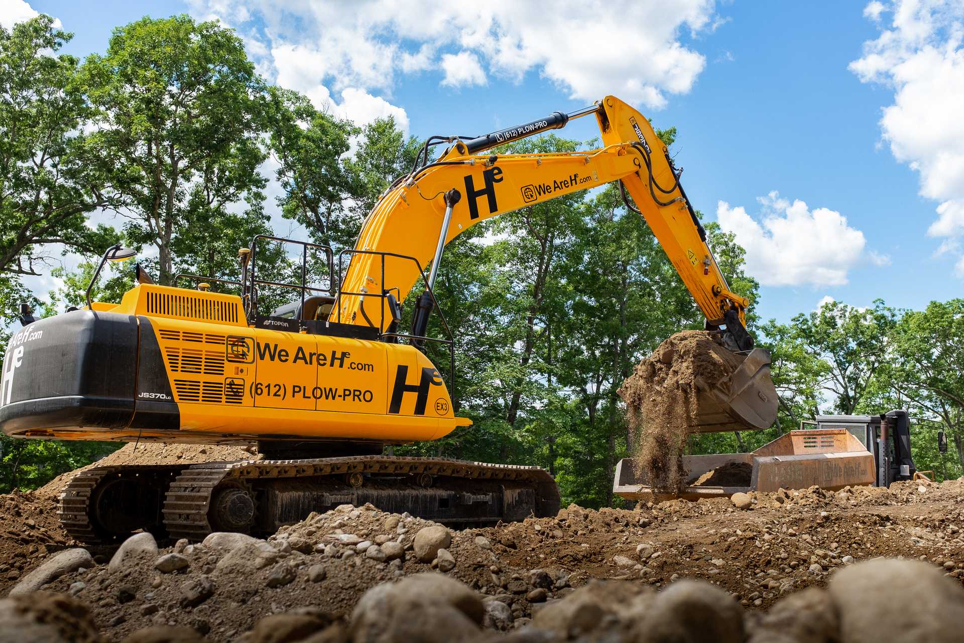 Hunter Environmental Excavator digging up foundation