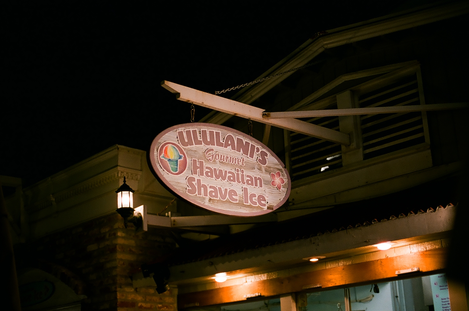ululani's shaved ice sign at night