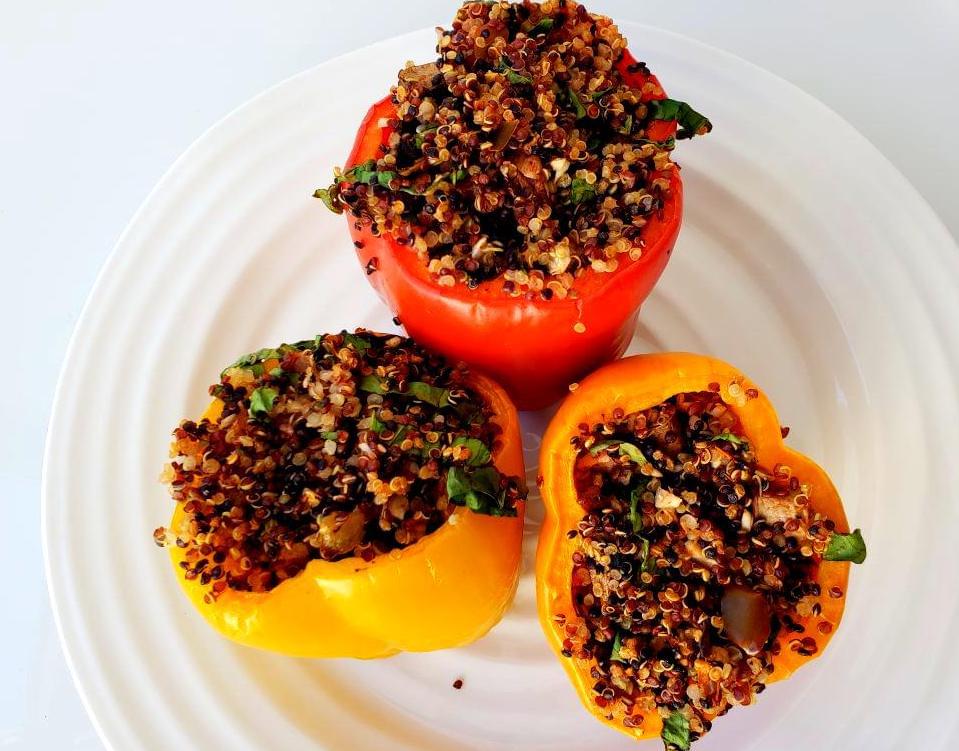Quinoa stuffed peppers with mushroom and spinach