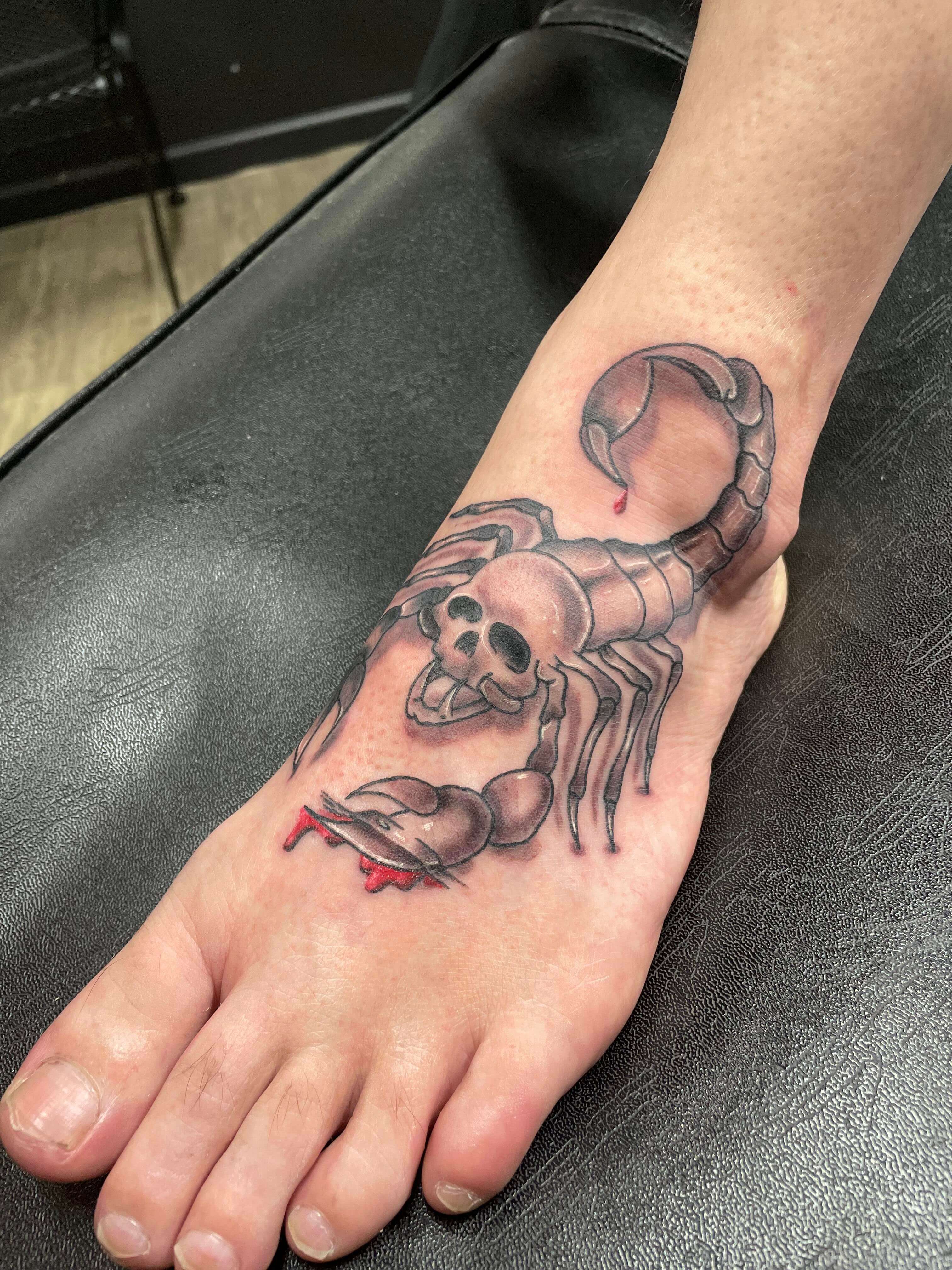 skull-scorpion tattoo