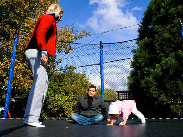 A family on a trampoline