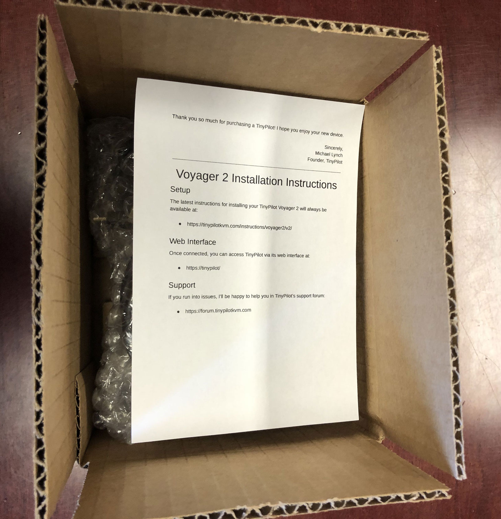Photo of Voyager 2 in cardboard shipping box