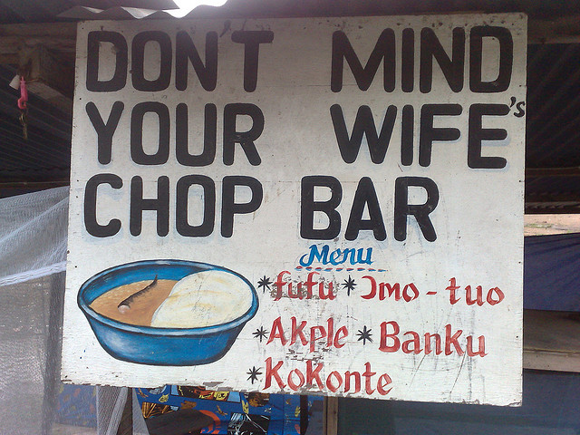 Chop bar sign that says "Don't Mind Your Wife."