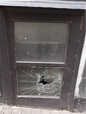 broken window in a London office