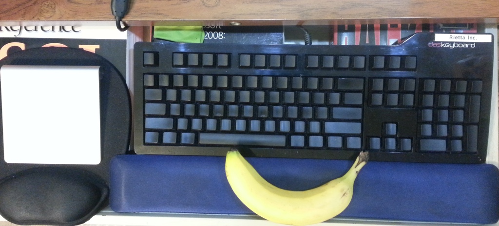 DAS Keyboard Ultimate with a Banana for Scale