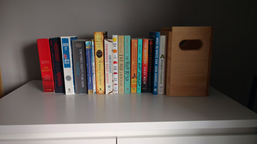 A few of those books sitting on an overflow shelf