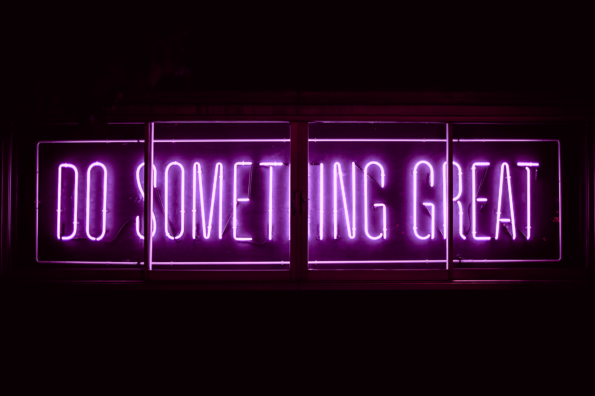 neon sign saying to do something great