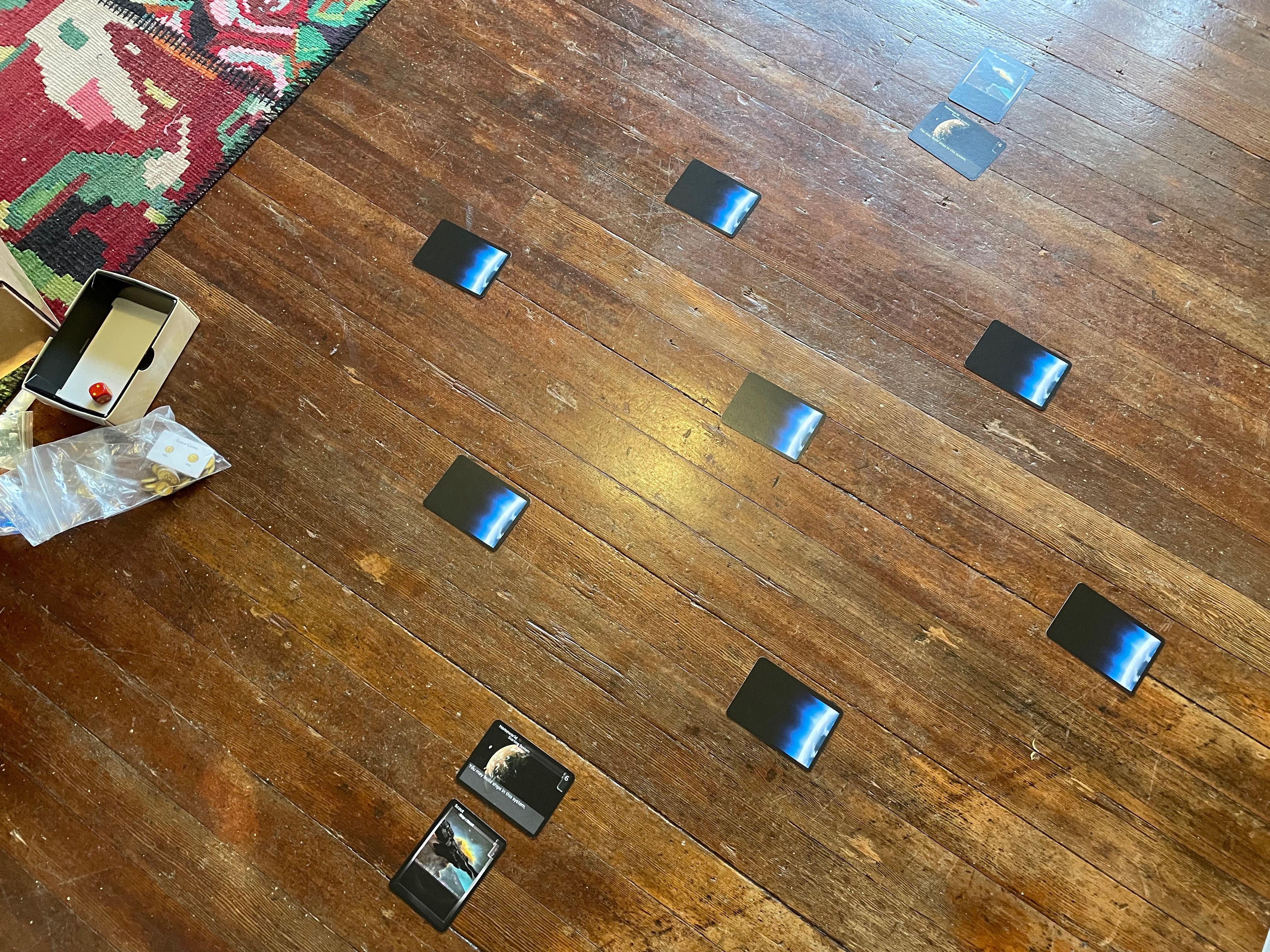 A grid of nine planet cards are laid out in a 3 by 3 layout, with space between.