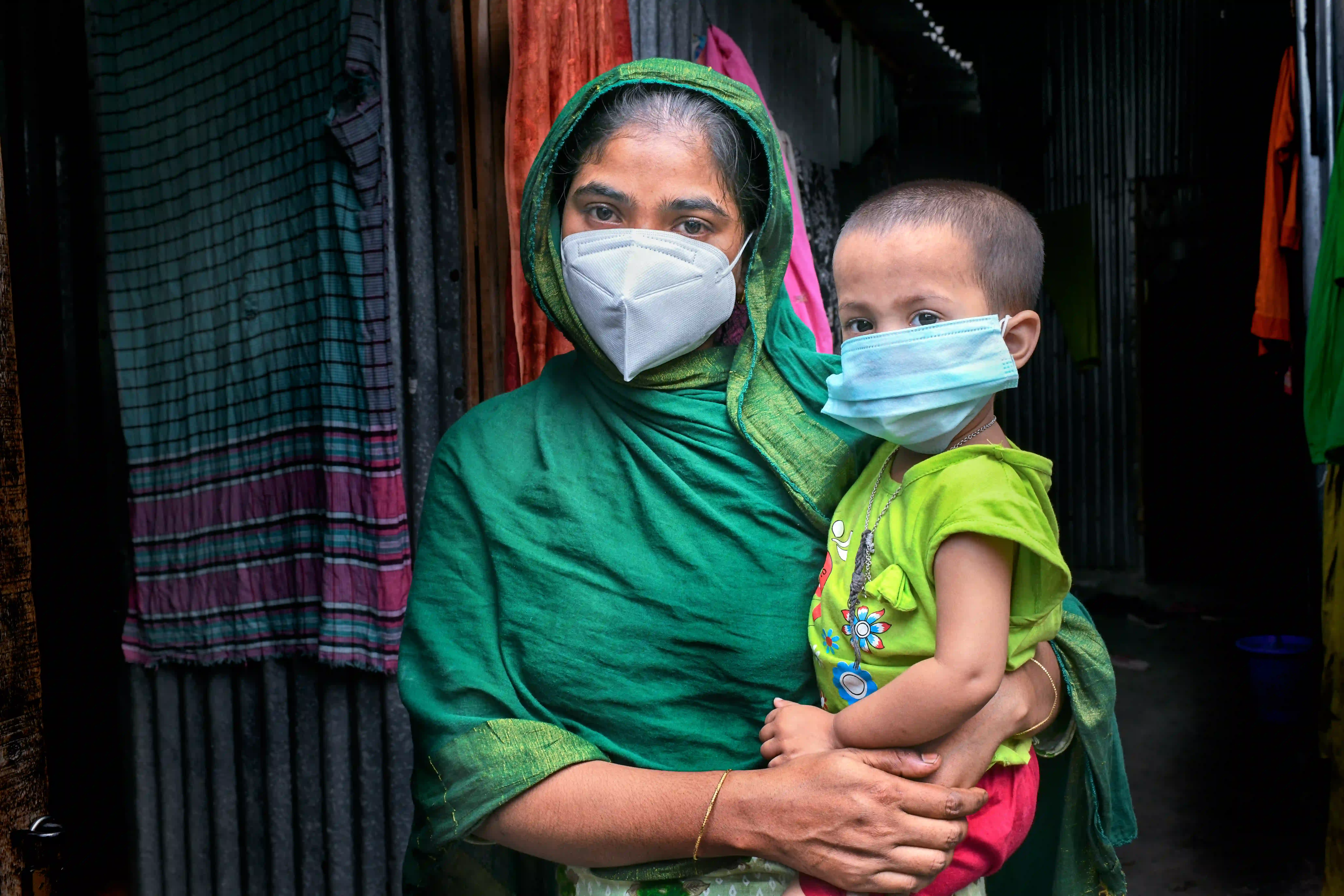 Woman and child in health masks