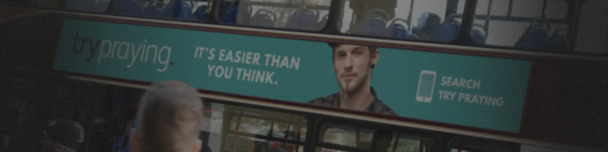 Trypraying advert on the side of a bus