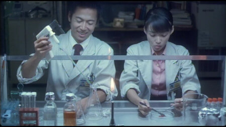 Toshiaki and Asakura are doing some scientific things, with lots of specialist equipment. There is a Bunsen burner in the middle of the frame Toshiaki and Asakura are doing some scientific things, with lots of specialist equipment. There is a Bunsen burner in the middle of the frame